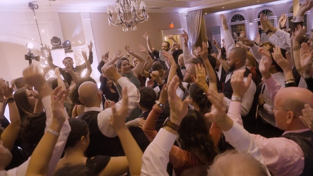 How to Create a Wedding Playlist That Keeps the Dance Floor Packed